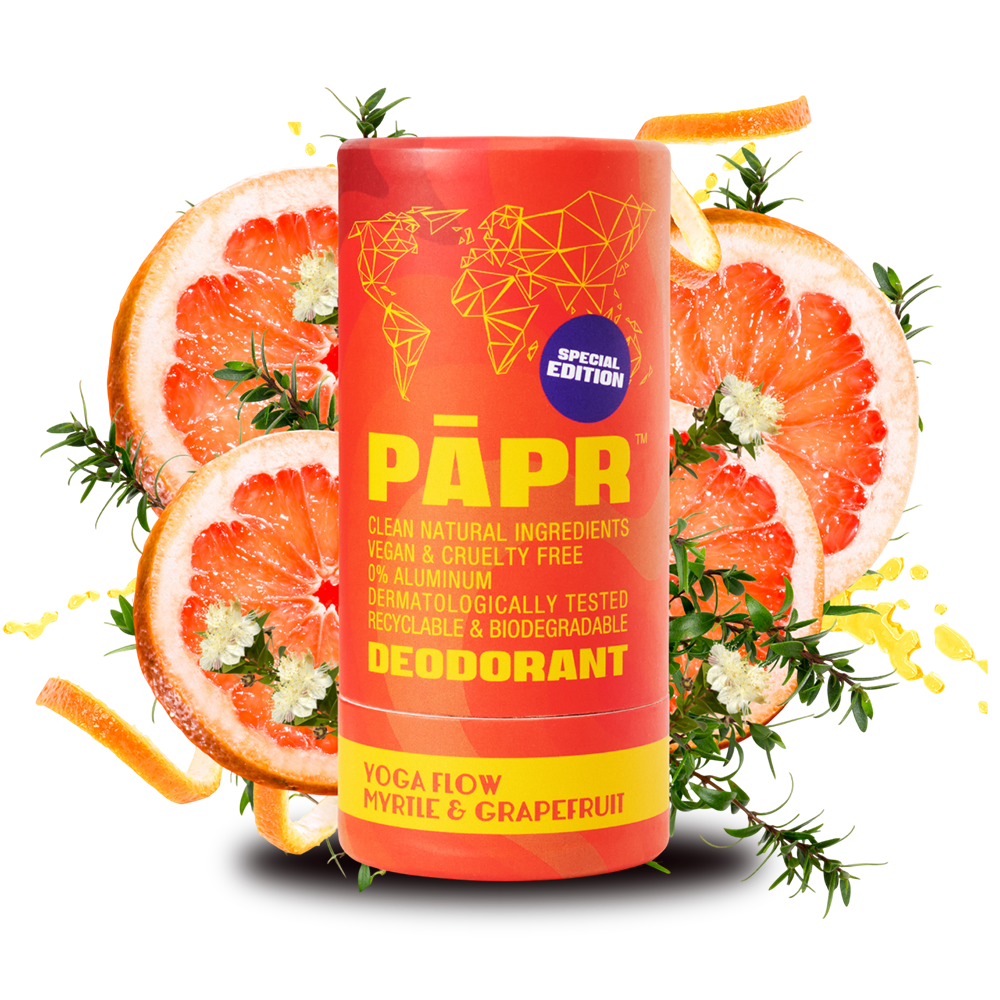 PAPR deodorant tube with grapefruit slices and leaves on a white background