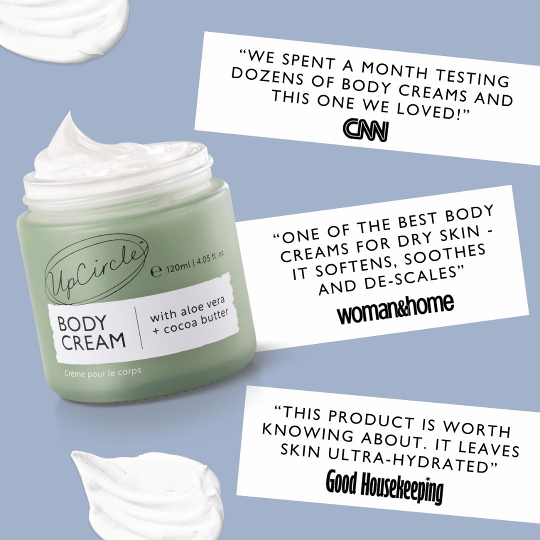 UpCircle body cream jar with positive reviews on a blue background