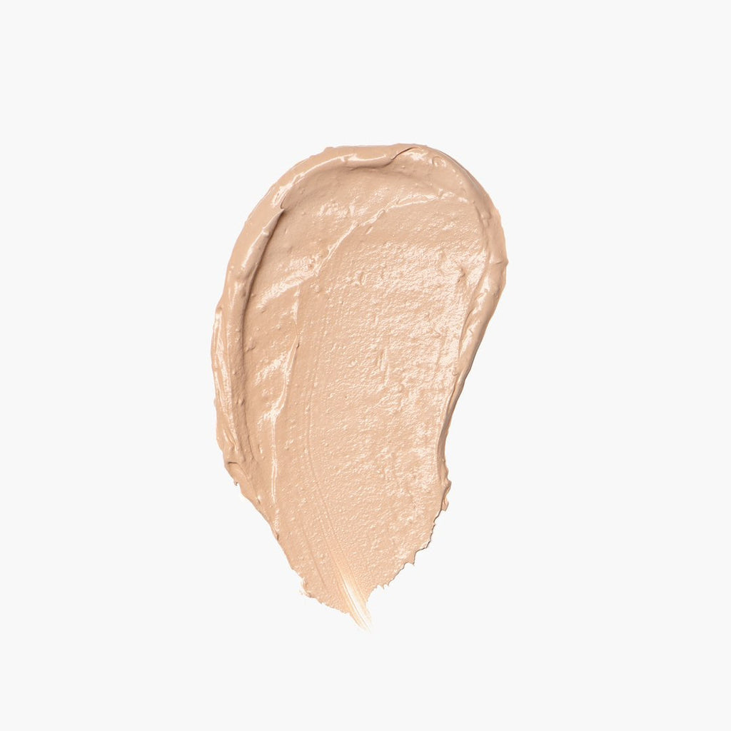 Beige foundation swatch on a light beige background