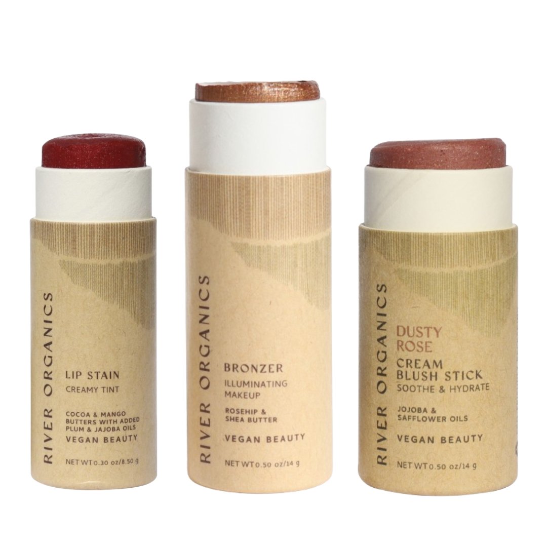 Three River Organics makeup sticks on a white background