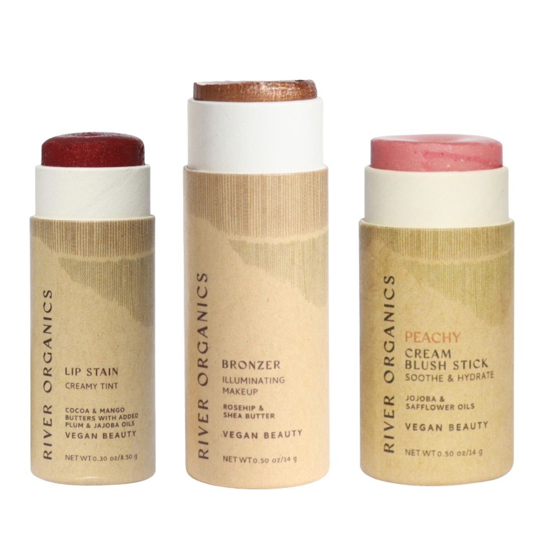 Three River Organics beauty sticks on a white background