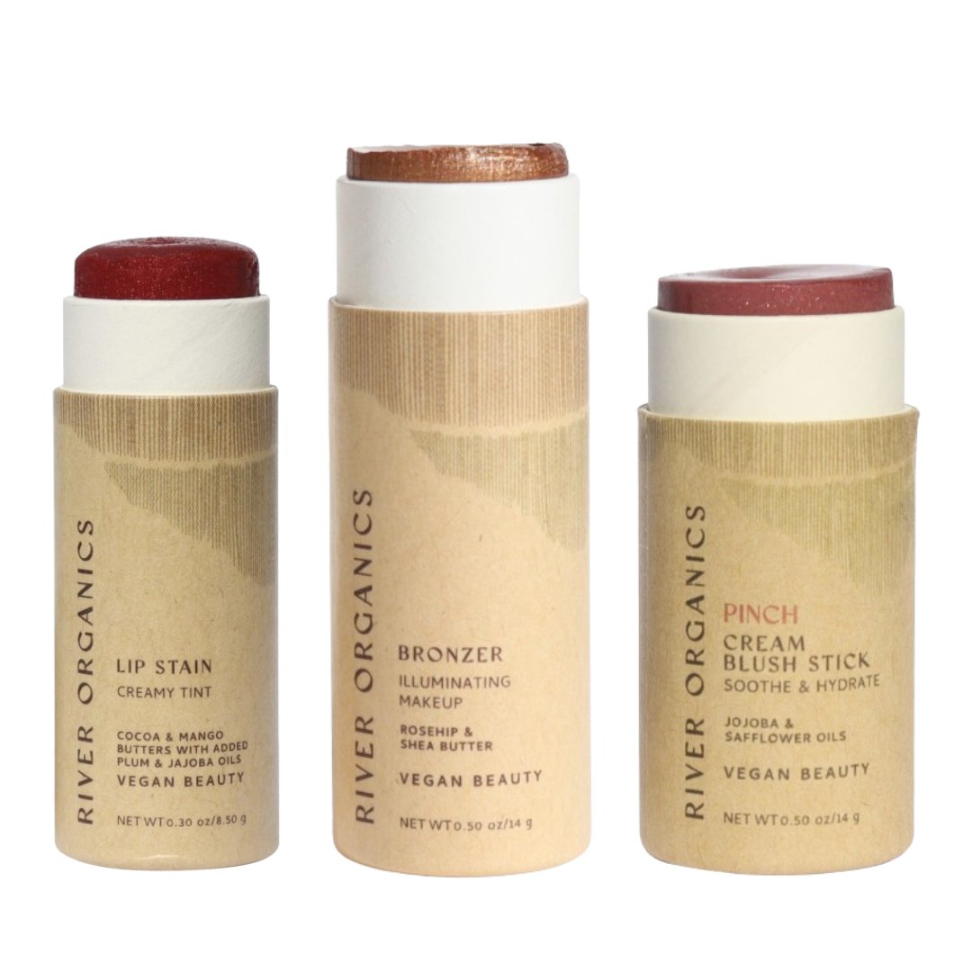 Three River Organics beauty sticks on a white background