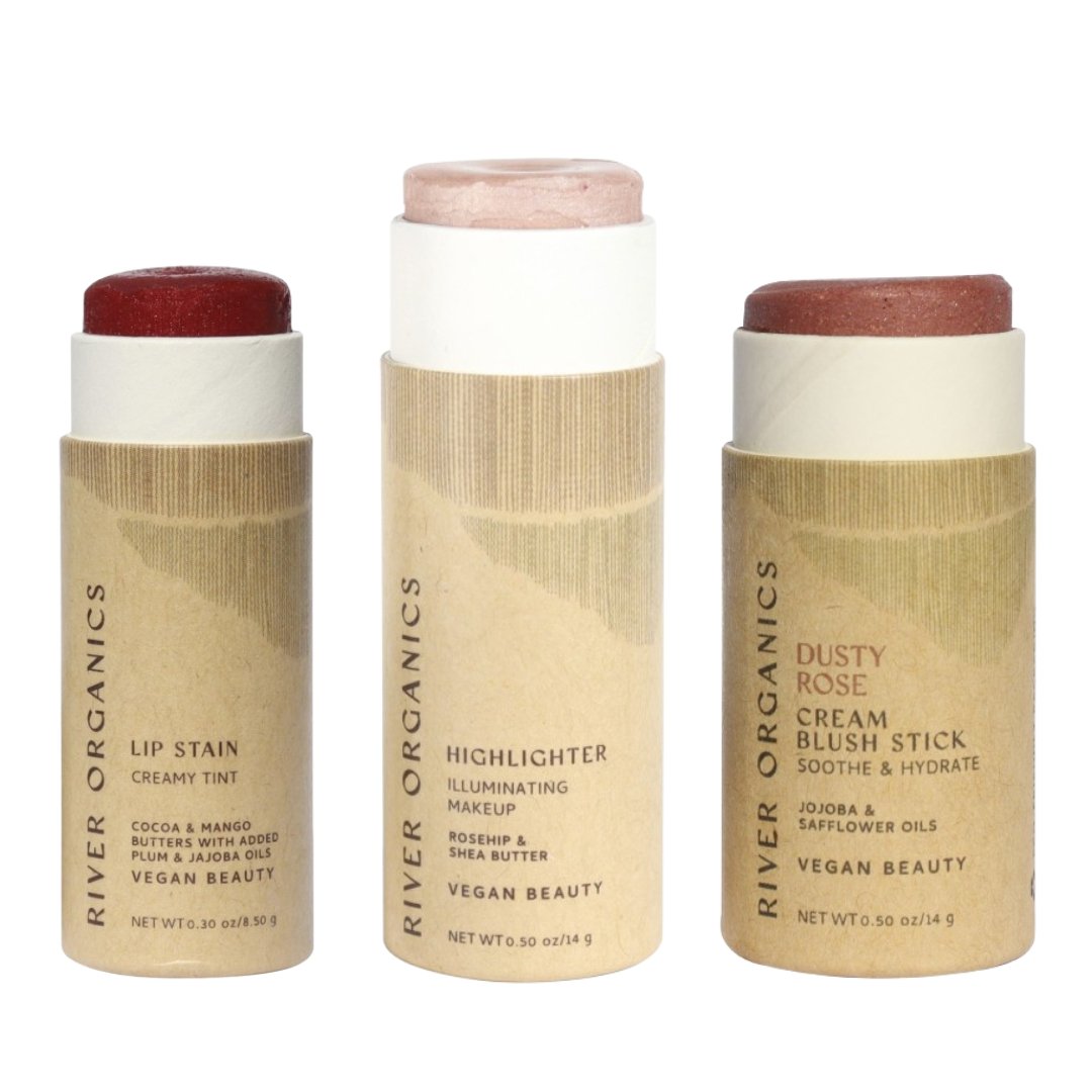 Three River Organics makeup sticks on a white background