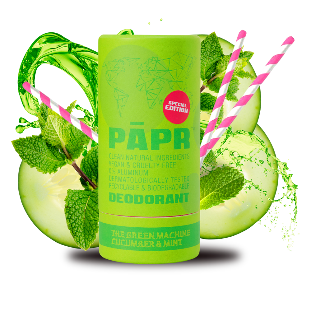 Green deodorant stick with cucumber and mint leaves on a white background