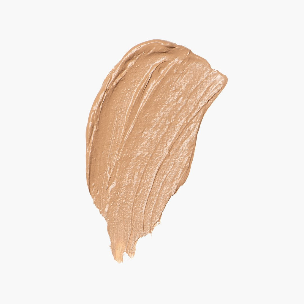 Beige foundation swatch on a white background
