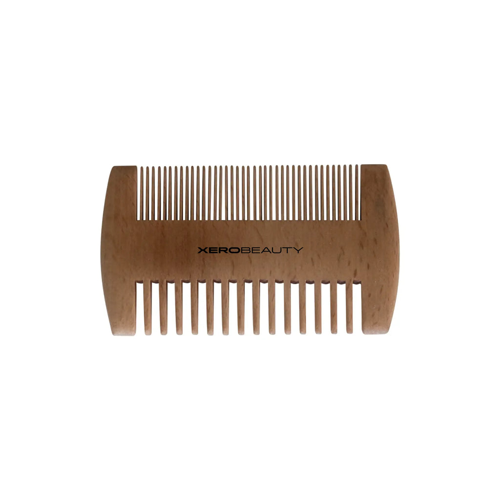 Double-sided bamboo comb on a white background, branded 'Xero Beauty'.
