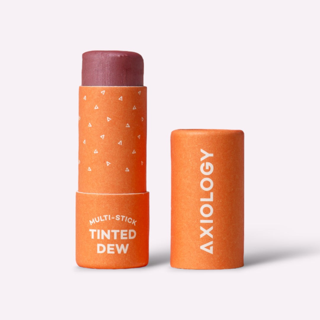 Axiology multi-stick tinted dew product on a white background