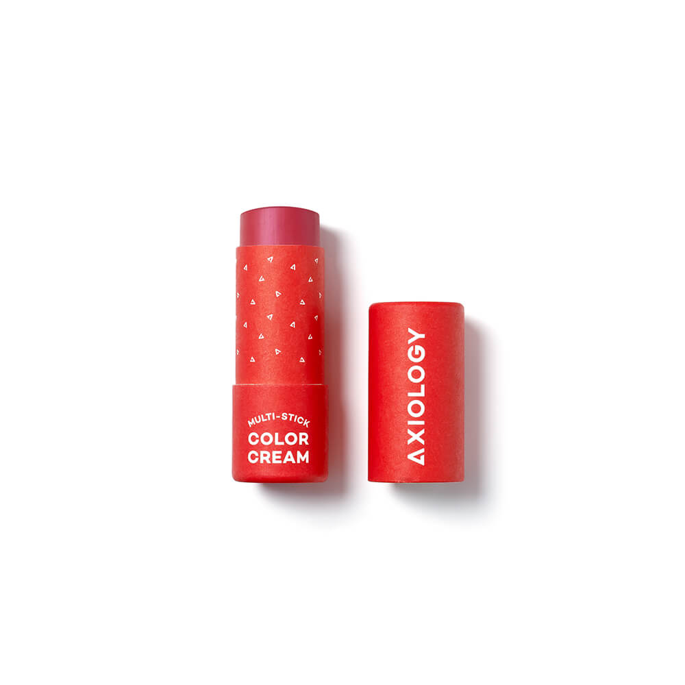 Pink cosmetic stick with 'Axiology' branding on a white background