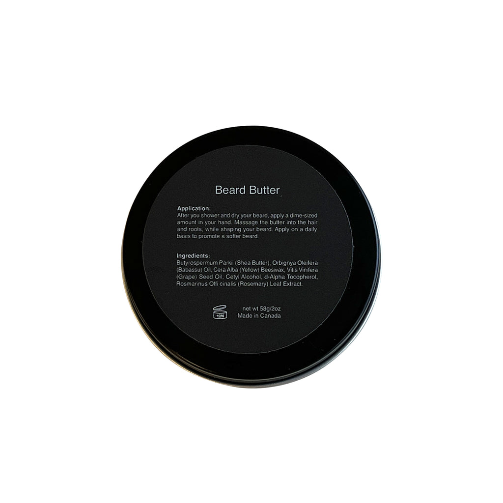 Ingredients list on back of a black container with text 'Beard Butter"