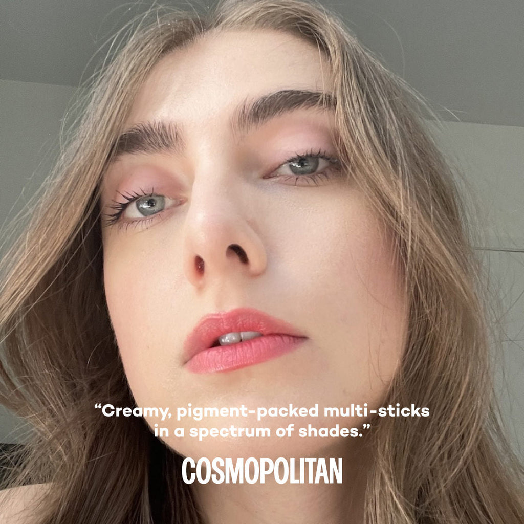 Close-up of a woman's face wearing makeup with text overlay about Cosmopolitan.