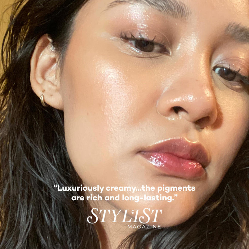 Close-up of a woman's face wearing makeup with text praising the product's quality.