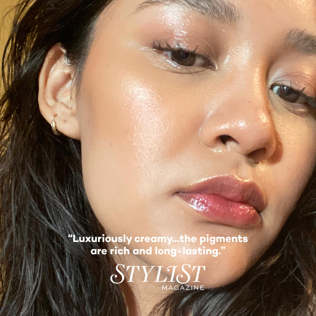 Close-up of a woman's face wearing makeup with text praising the product's quality.