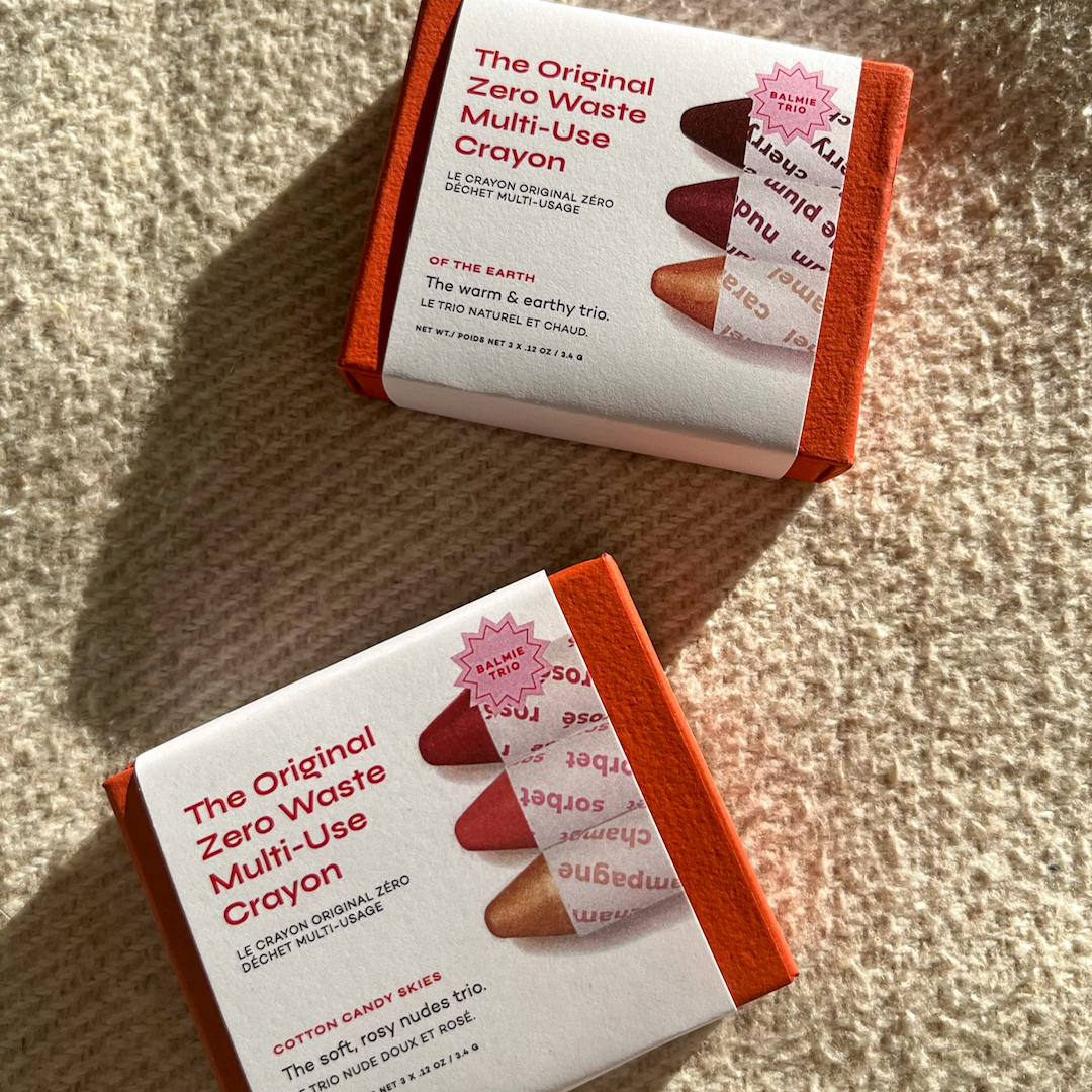 Two boxes of 'The Original Zero Waste Multi-Use Crayon' on a textured surface.