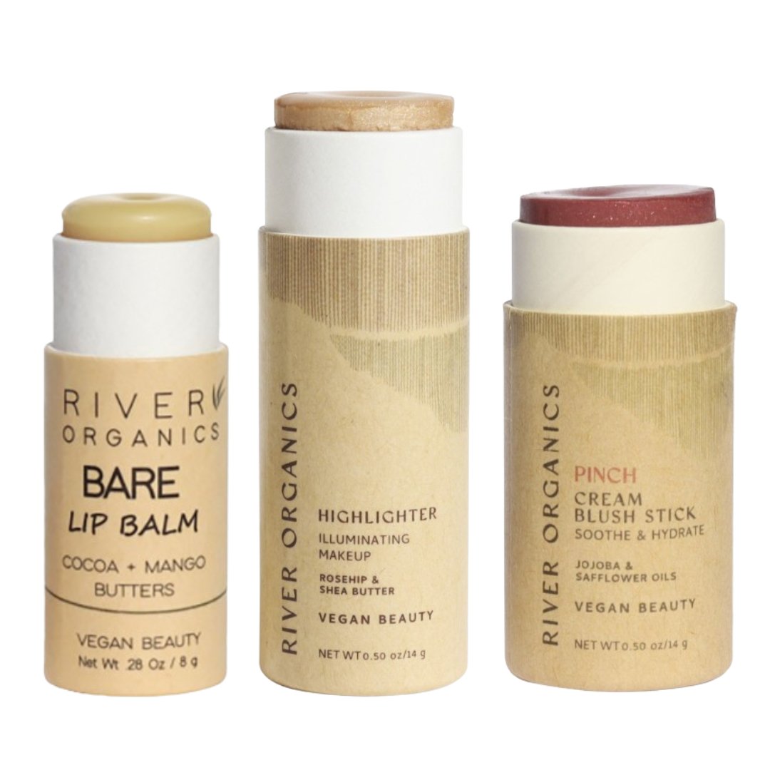 Three River Organics makeup sticks on a white background