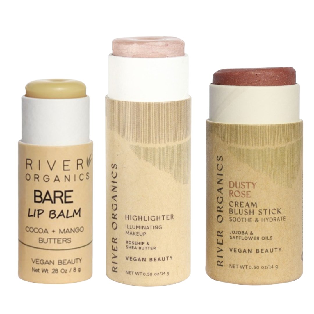 Three River Organics makeup sticks on a white background