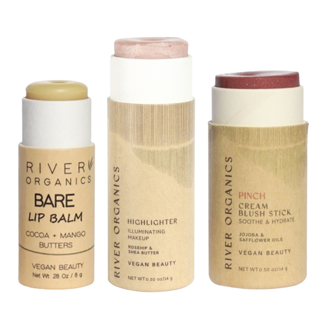 Three River Organics makeup sticks on a white background