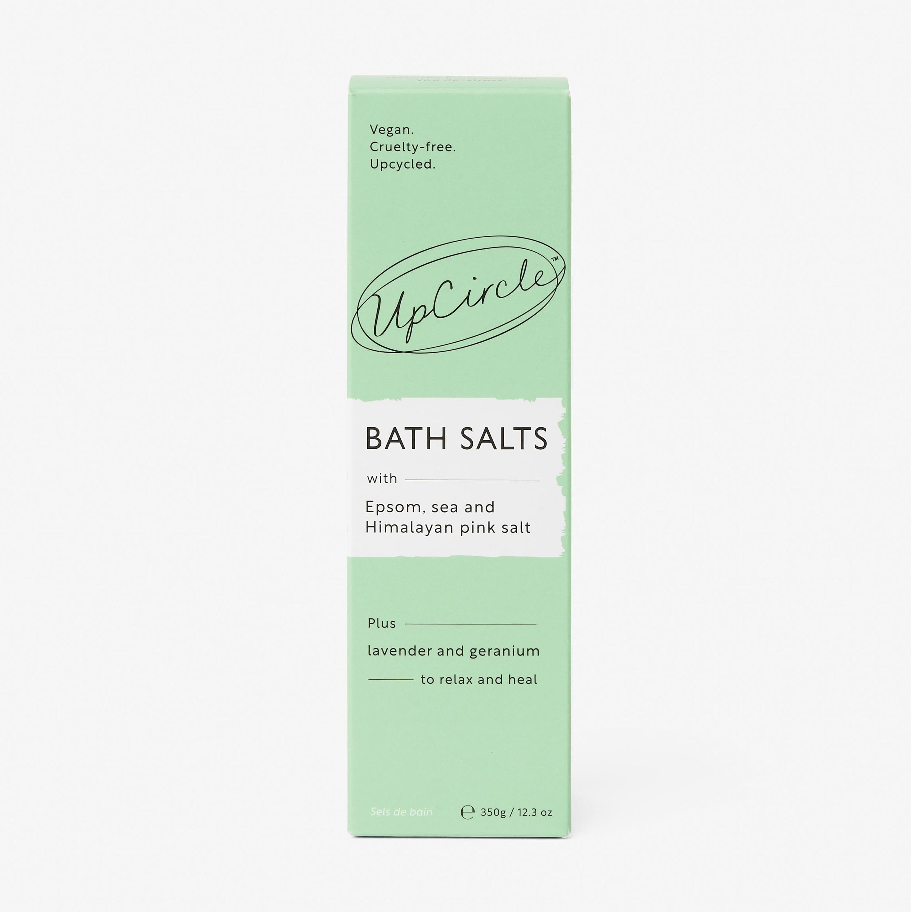 Green box of UpCircle bath salts on a white background