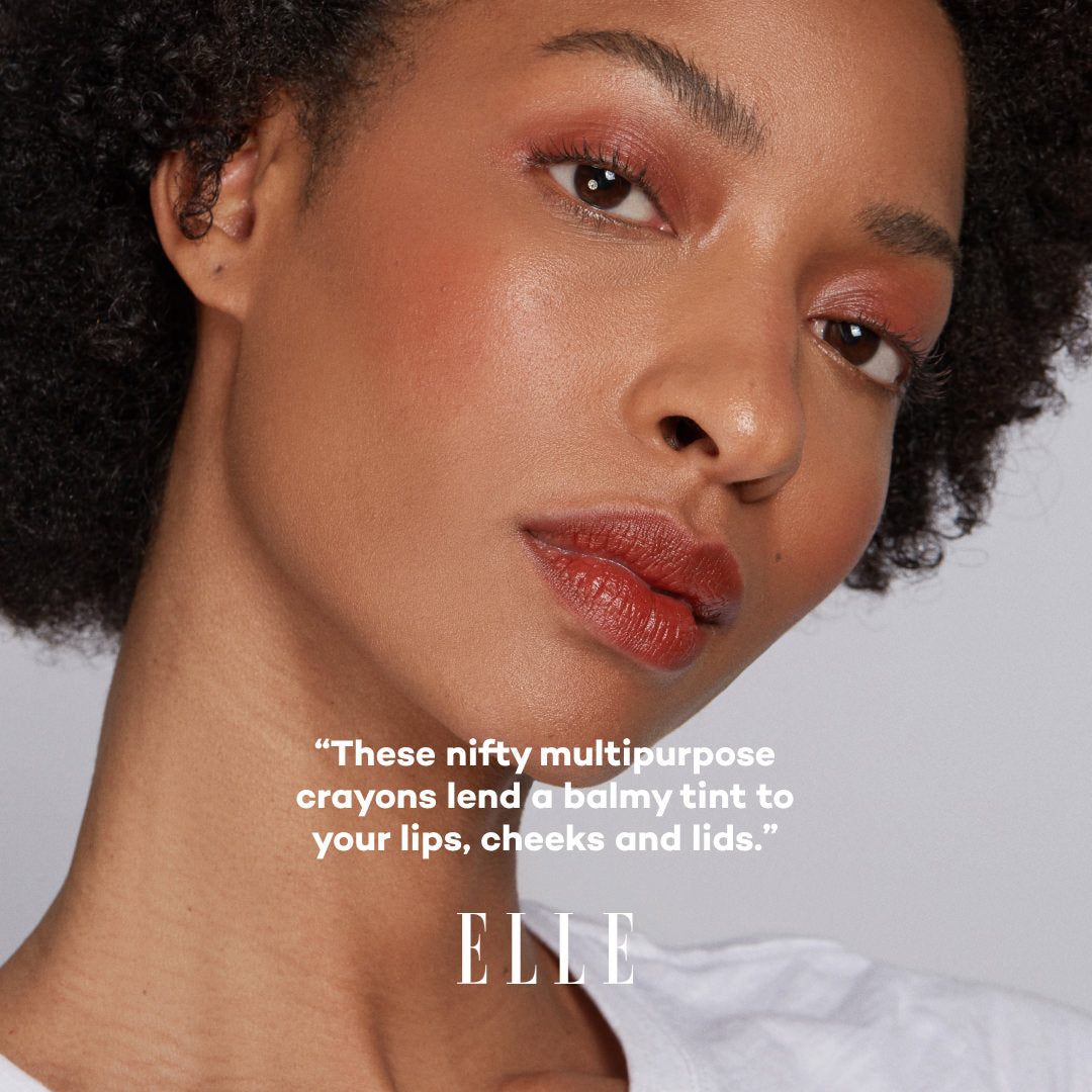 Close-up of a woman's face with makeup products, featuring text and the ELLE logo.