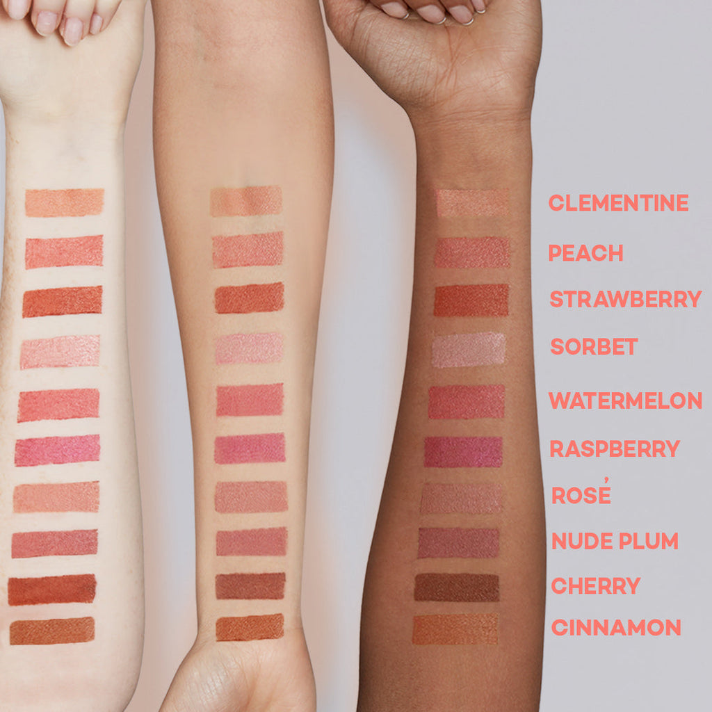 Color swatches on arms with labeled lip crayon shades against a neutral background