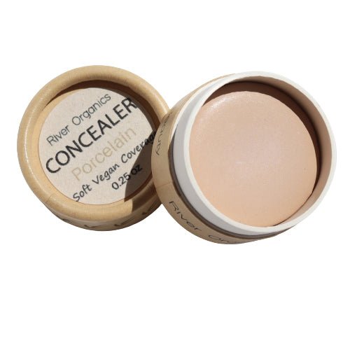 Open container of River Organics Porcelain Concealer on a white background
