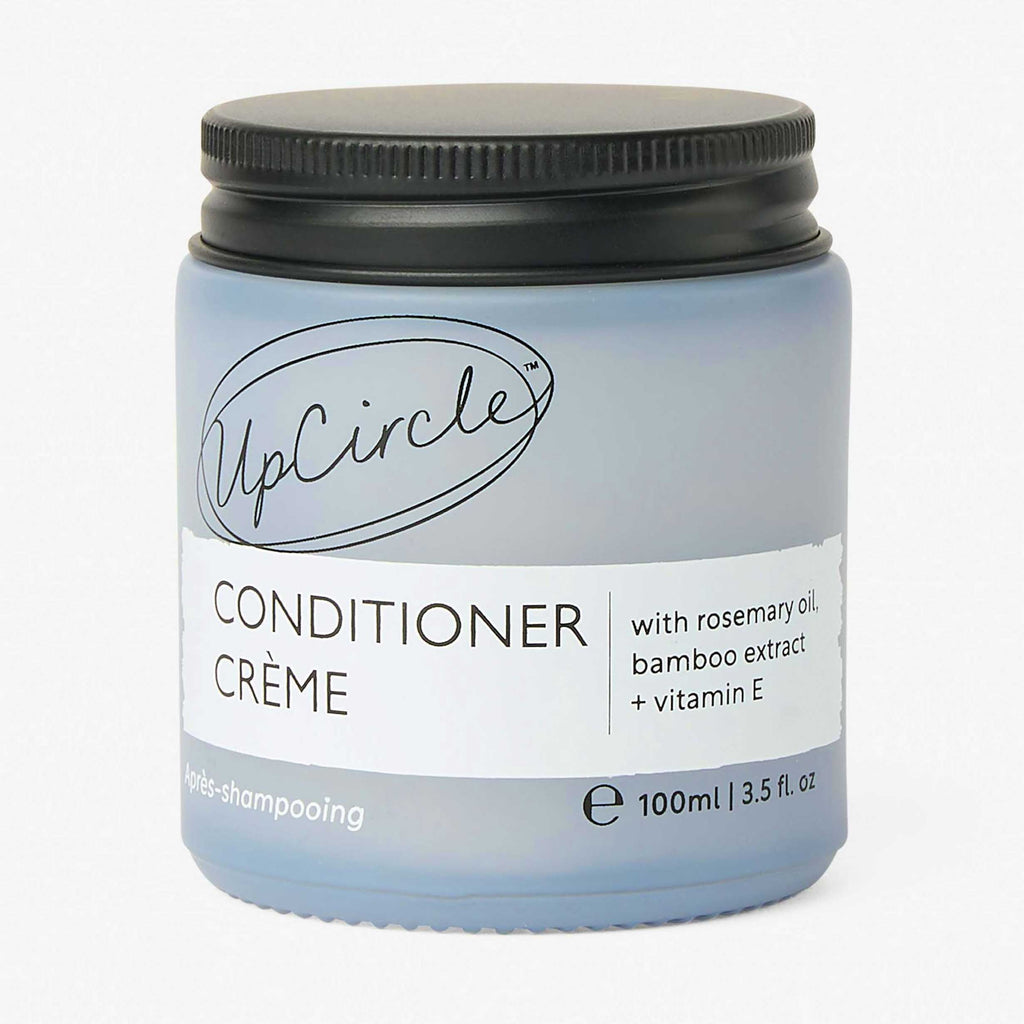 UpCircle Conditioner Crème jar with black lid on a white background