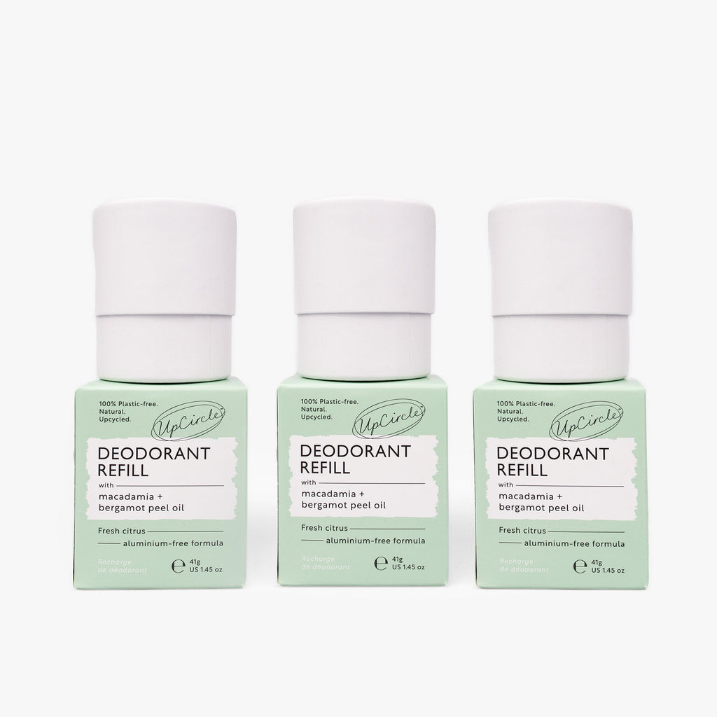 Three deodorant refills with green boxes on a white background