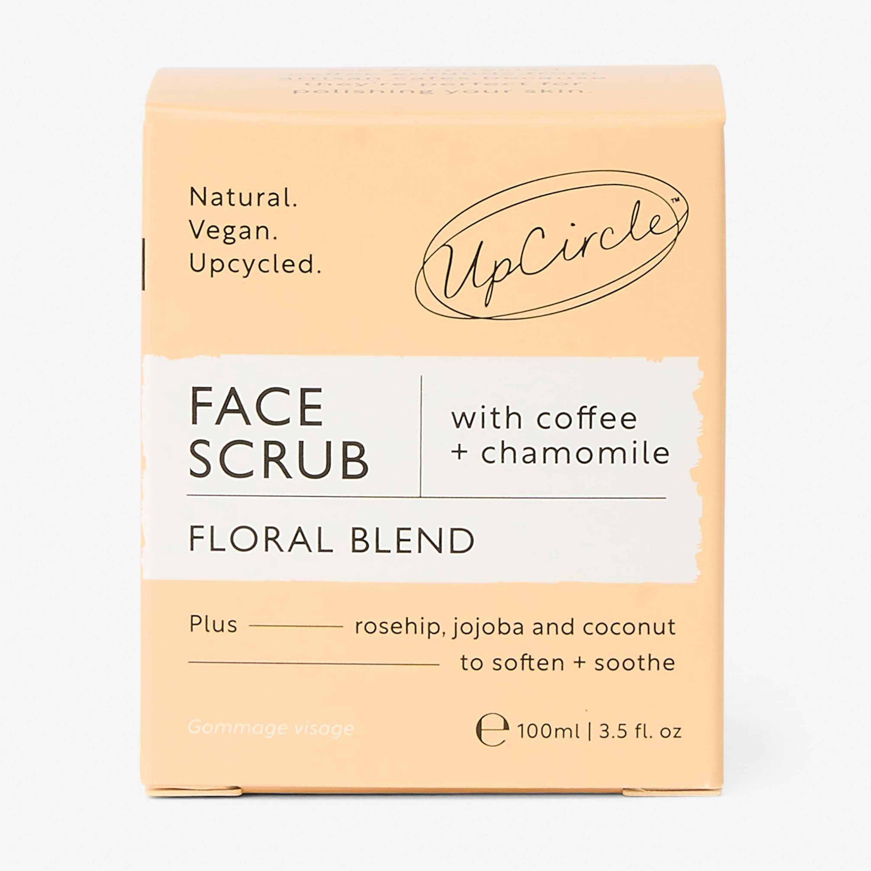 UpCircle Face Scrub packaging with coffee and chamomile on a light background