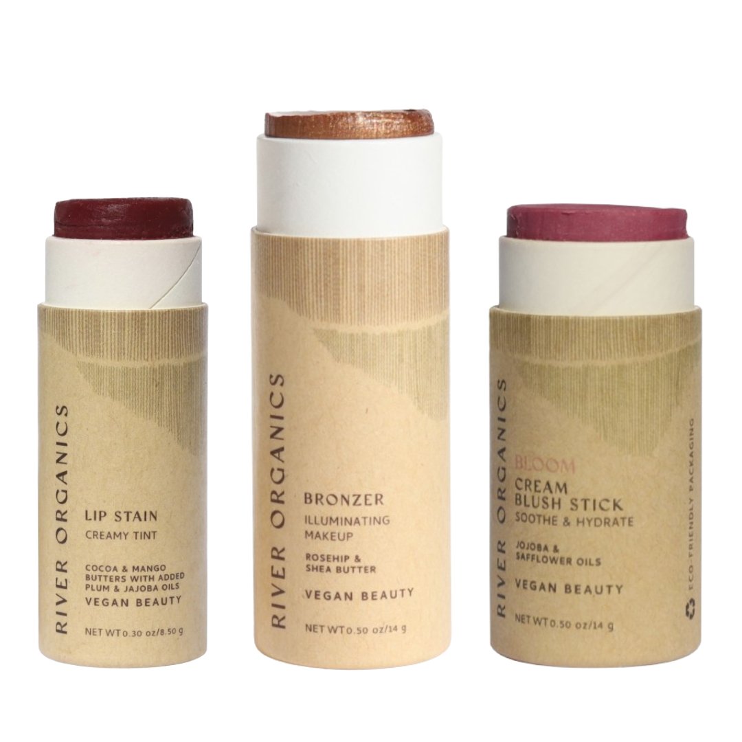 Three River Organics makeup sticks on a white background