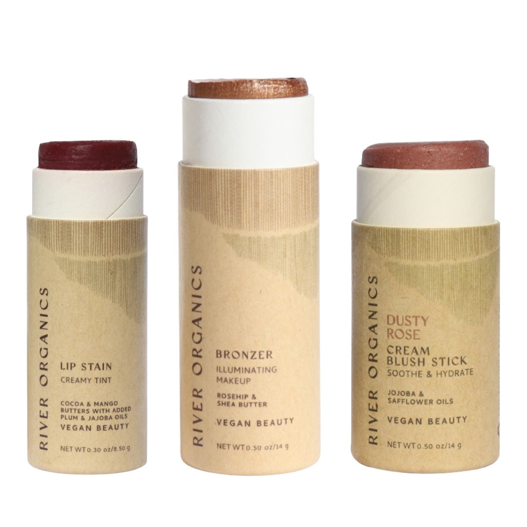 Three River Organics makeup sticks on a white background