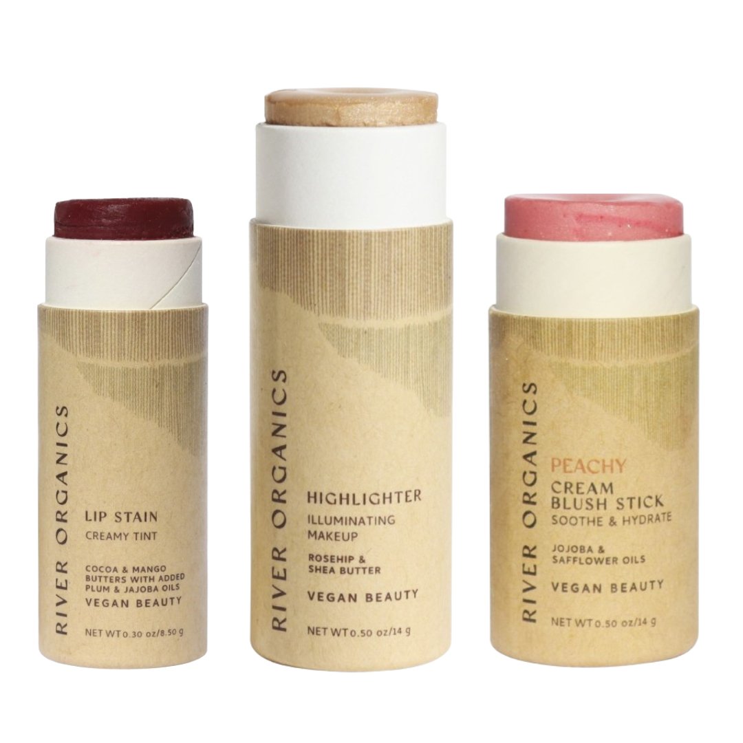 Three River Organics beauty sticks on a white background