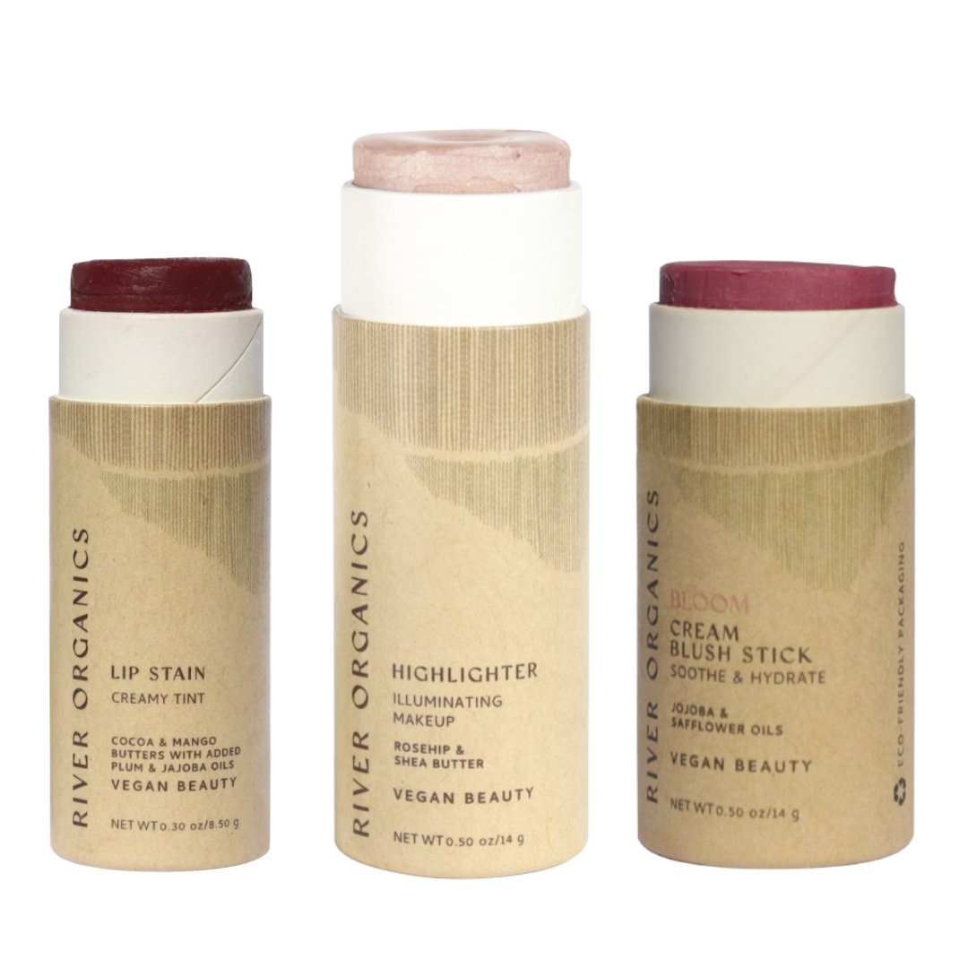 Three River Organics makeup sticks on a white background