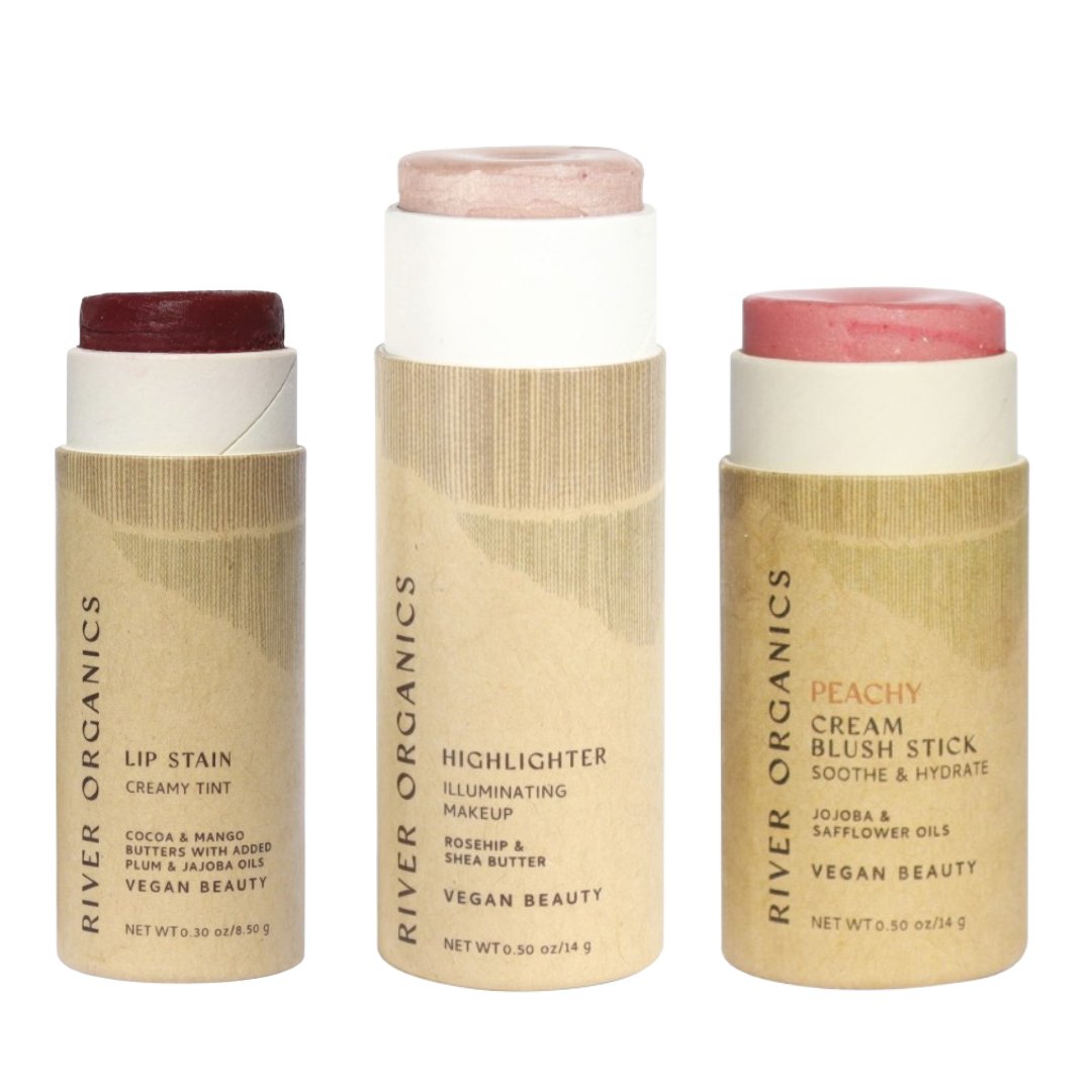 Three River Organics makeup sticks on a white background