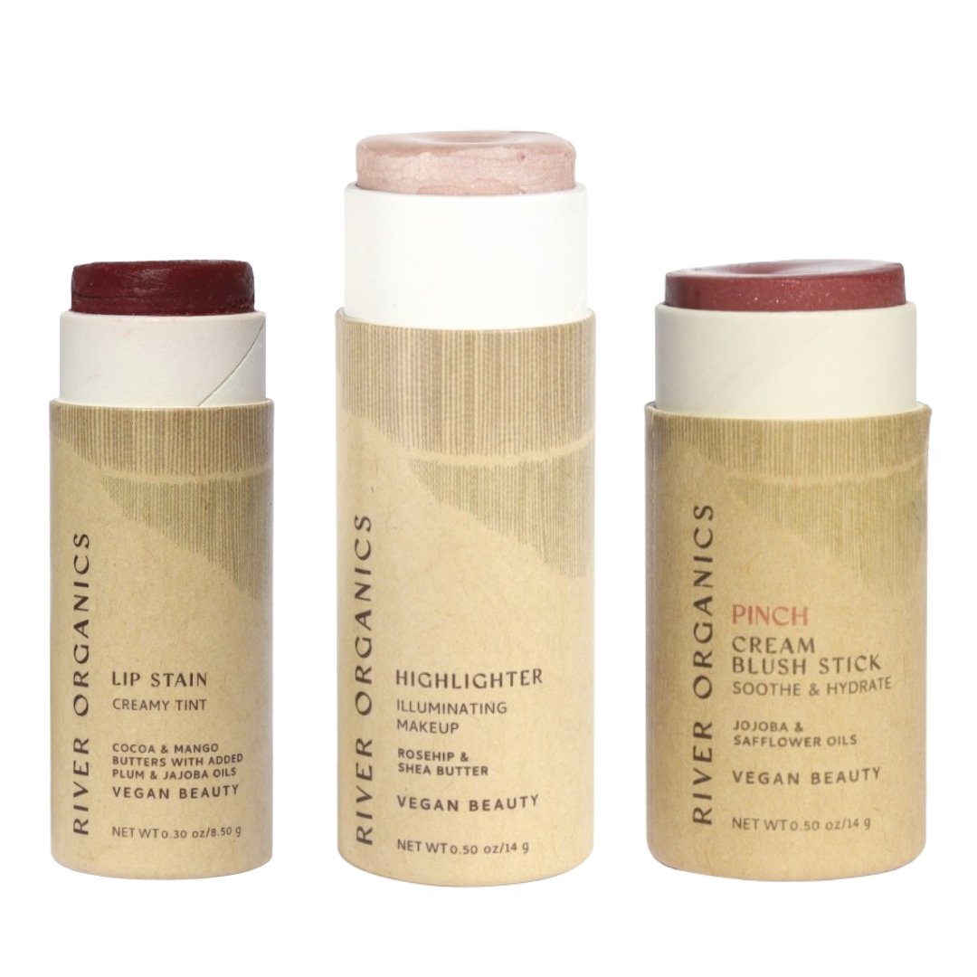 Three River Organics makeup sticks on a white background