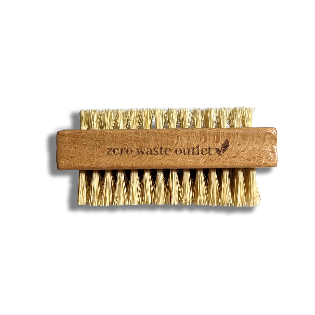 Bamboo nail brush with natural bristles and 'zero waste outlet' branding on a transparent background
