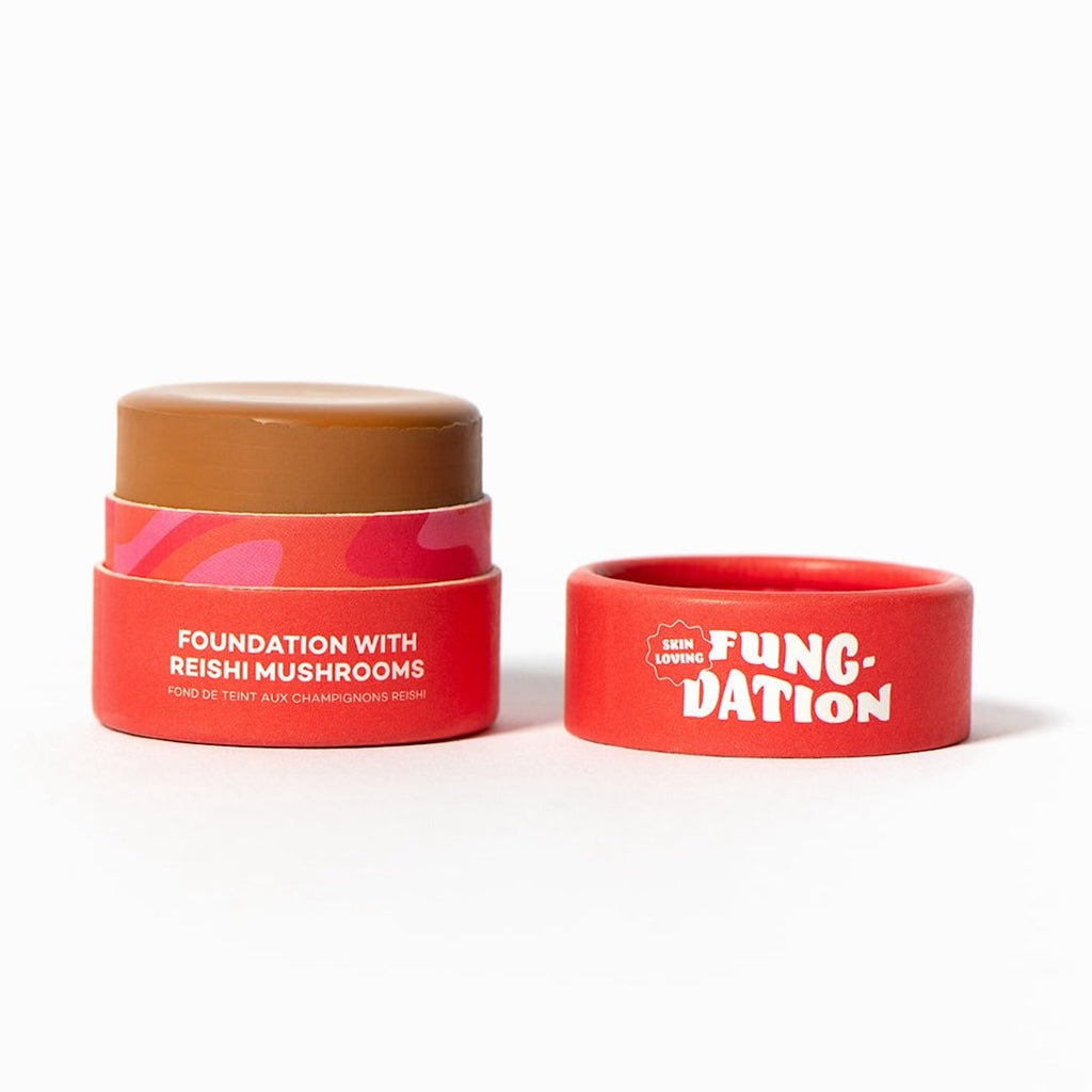 Red cosmetic pot with 'Fung-Dation' branding on a white background