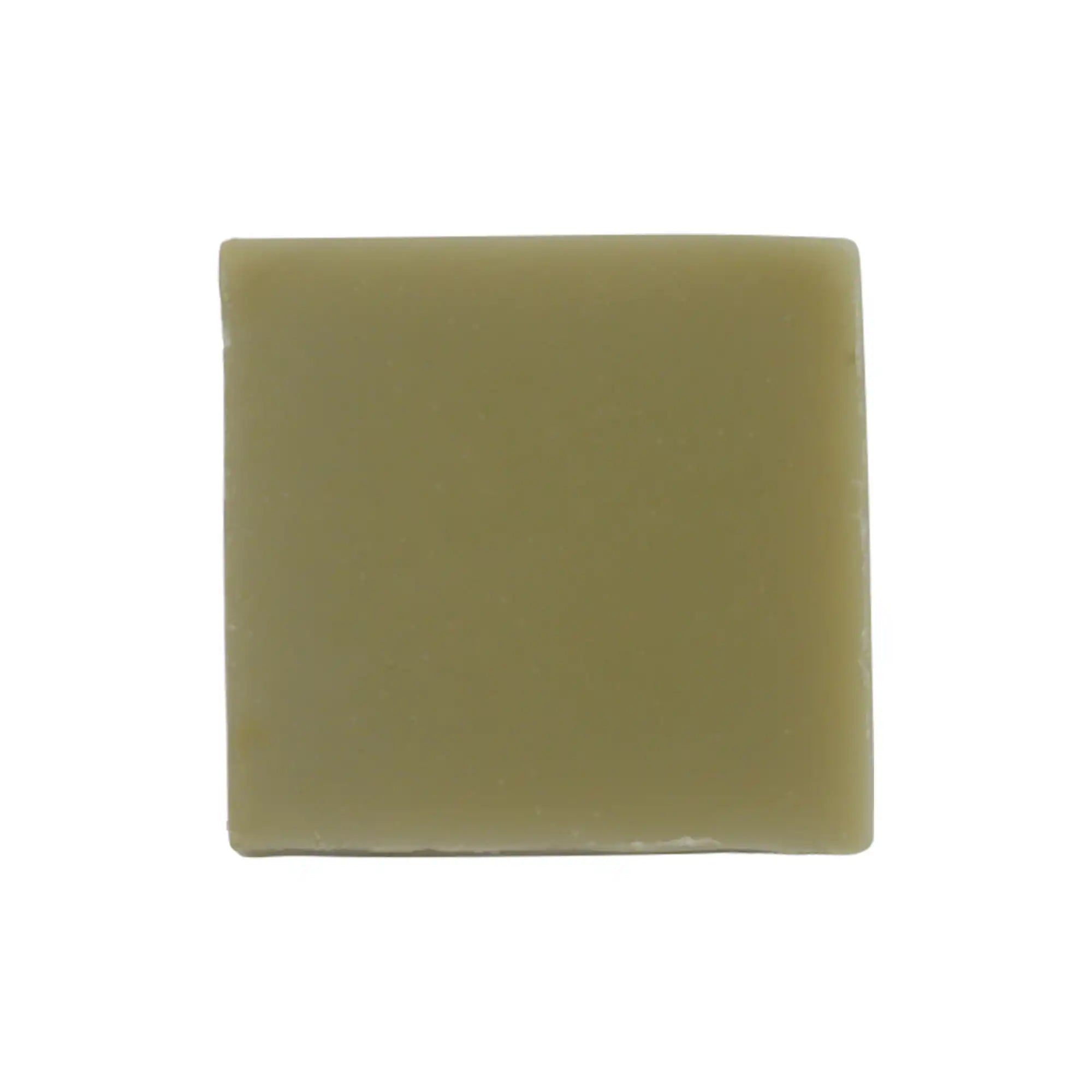 Light green soap bar on a white background