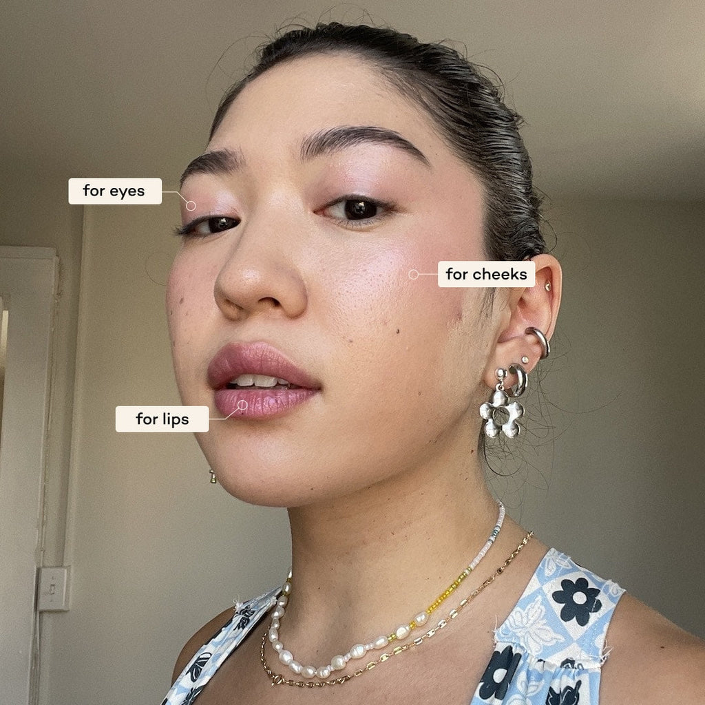 Woman with makeup application labels on her face