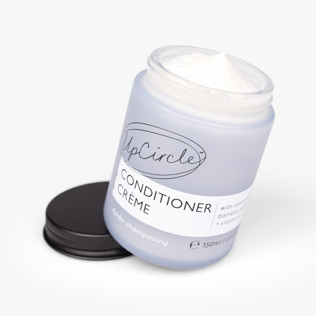 UpCircle Conditioner Crème jar with black cap on a white background