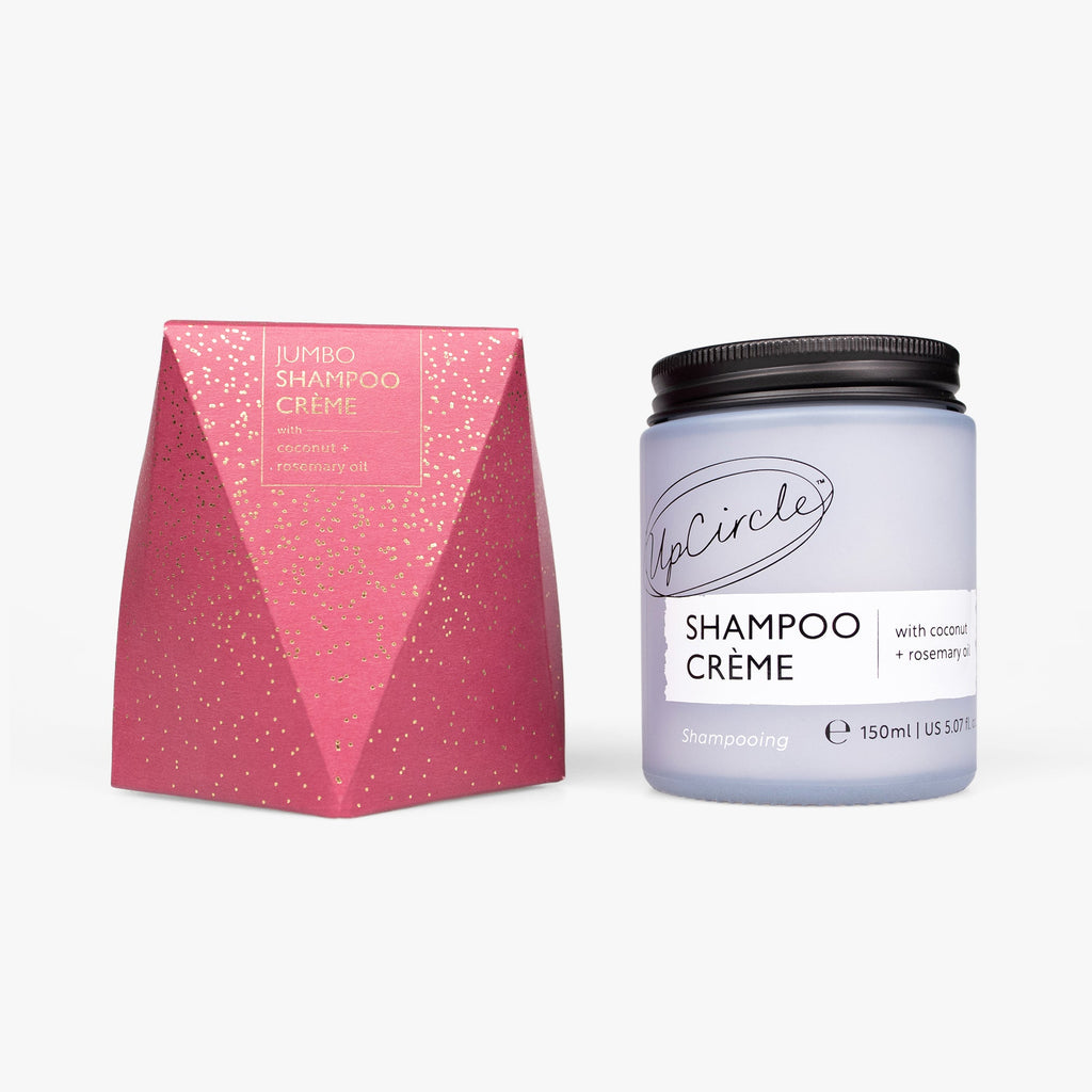 Shampoo crème jar with pink packaging on a white background