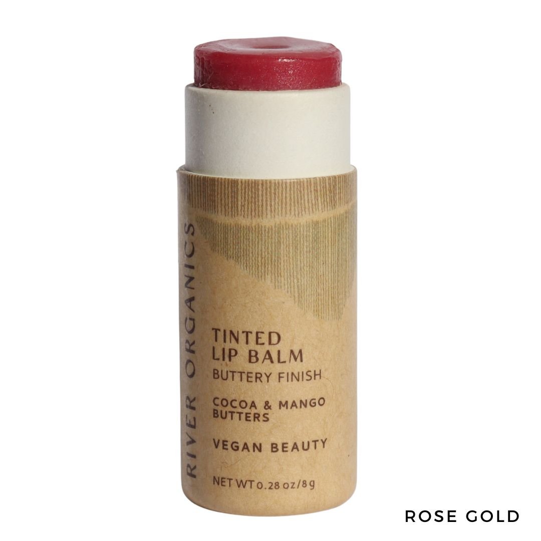 Tinted lip balm with a brown paper tube on a white background