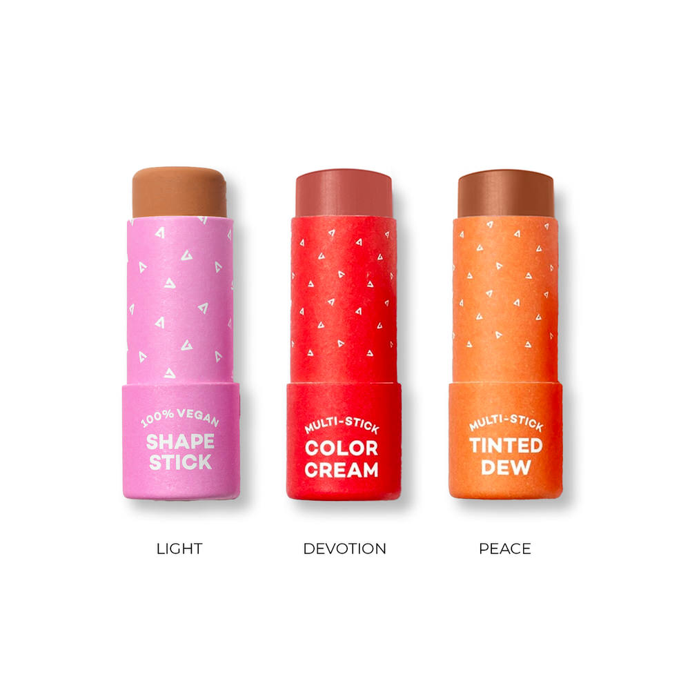 Three cosmetic sticks in pink, red, and orange with labels on a white background