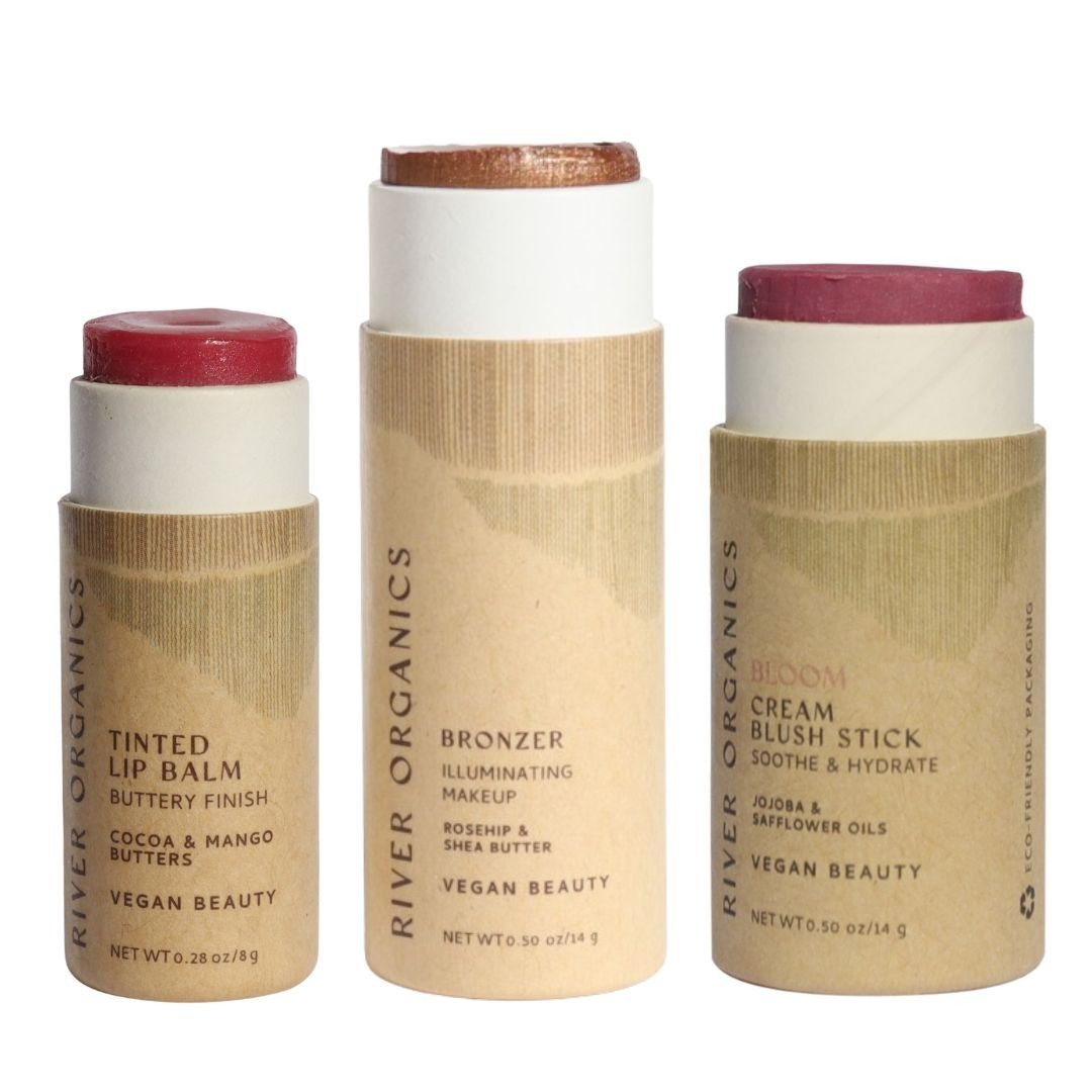 Three River Organics makeup sticks on a white background