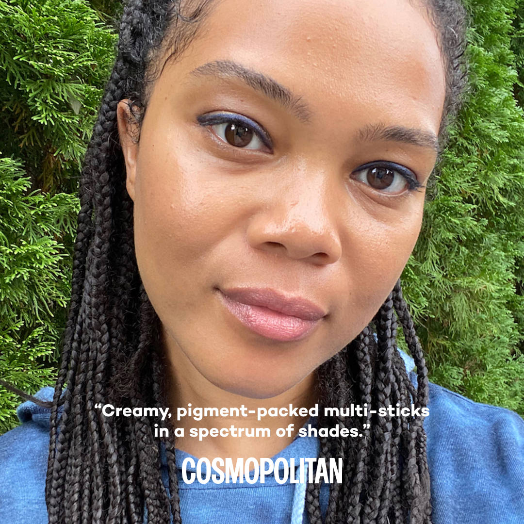 Woman with braided hair against a green background, with text overlay about Cosmopolitan.