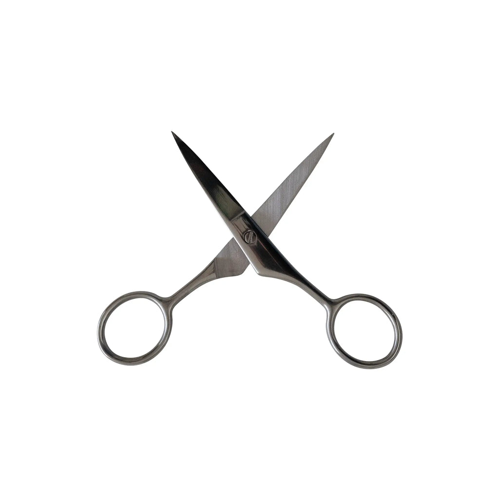 Pair of scissors on a white background