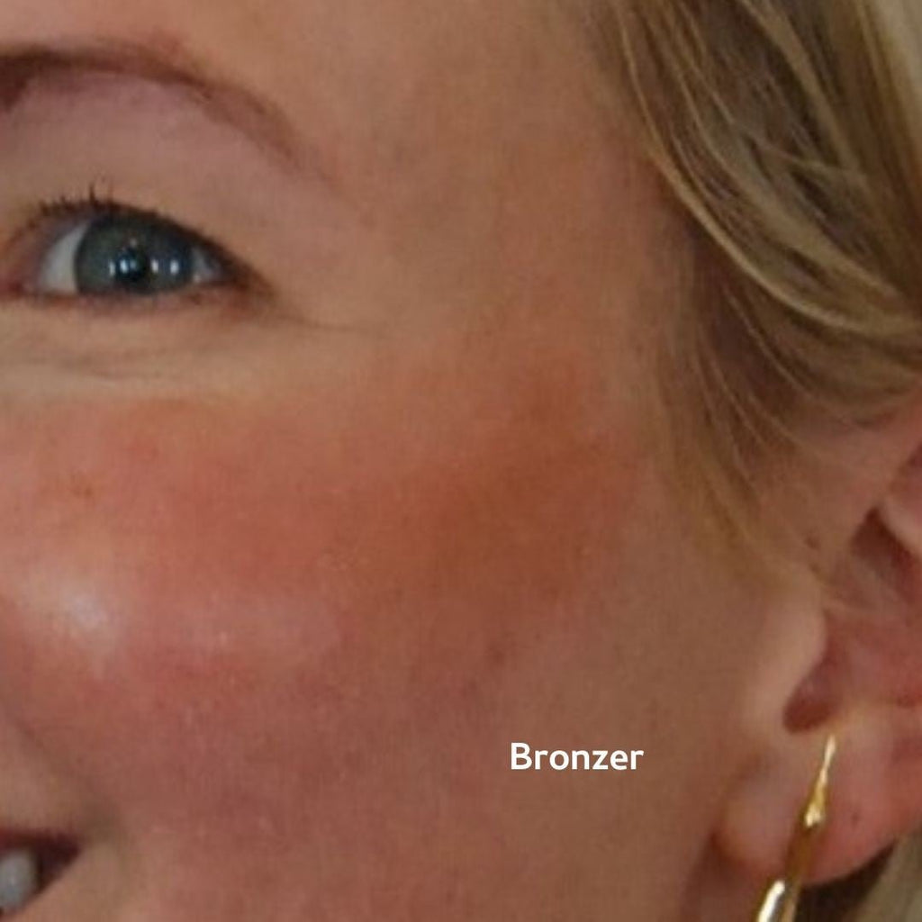 Close-up of a person's face with bronzer applied to cheek