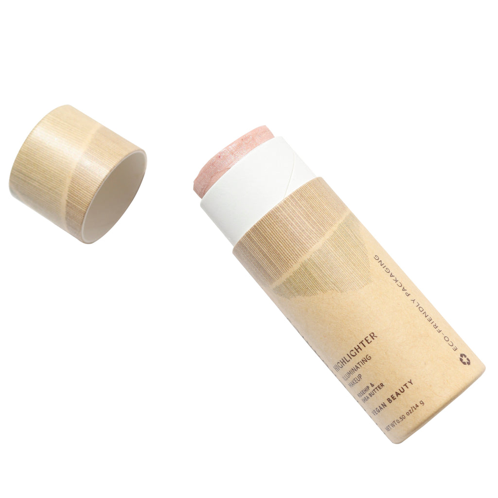Rose Quartz highlighter stick with paper casing on a white background