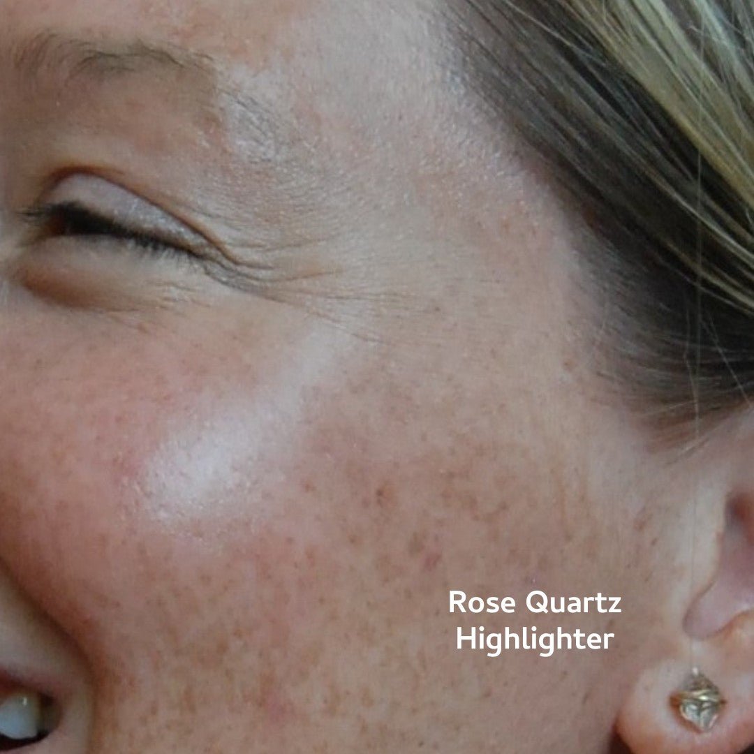 Rose Quartz Highlighter applied to a person's face with visible texture and color.