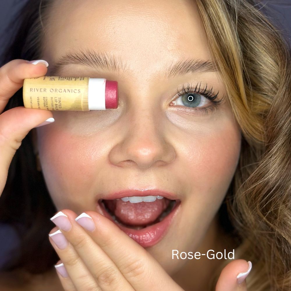 Person holding a River Organics product near their face with 'Rose-Gold' text.