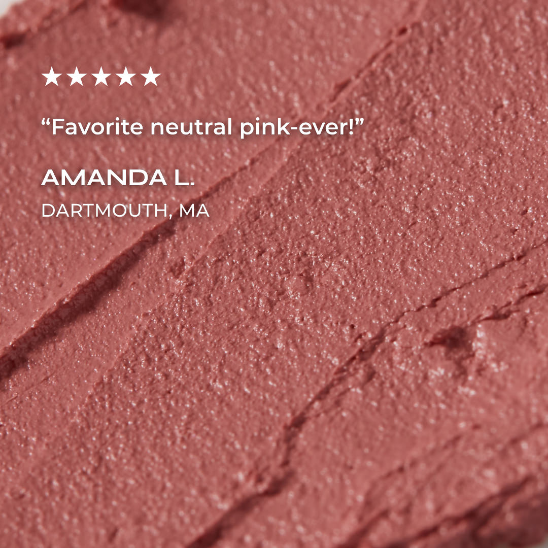 Close-up of a pink makeup swatch with a five-star rating and customer review.