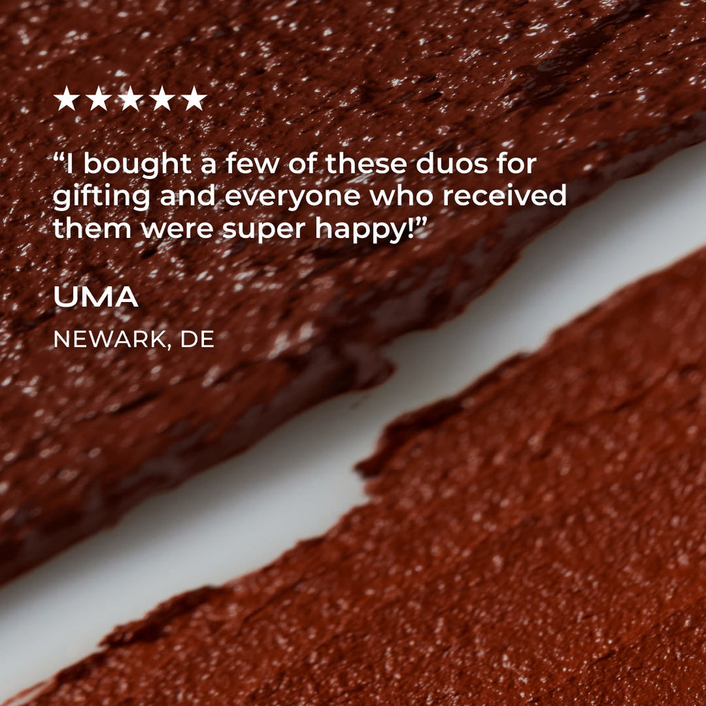 Close-up of red-brown makeup products with a customer review overlay.